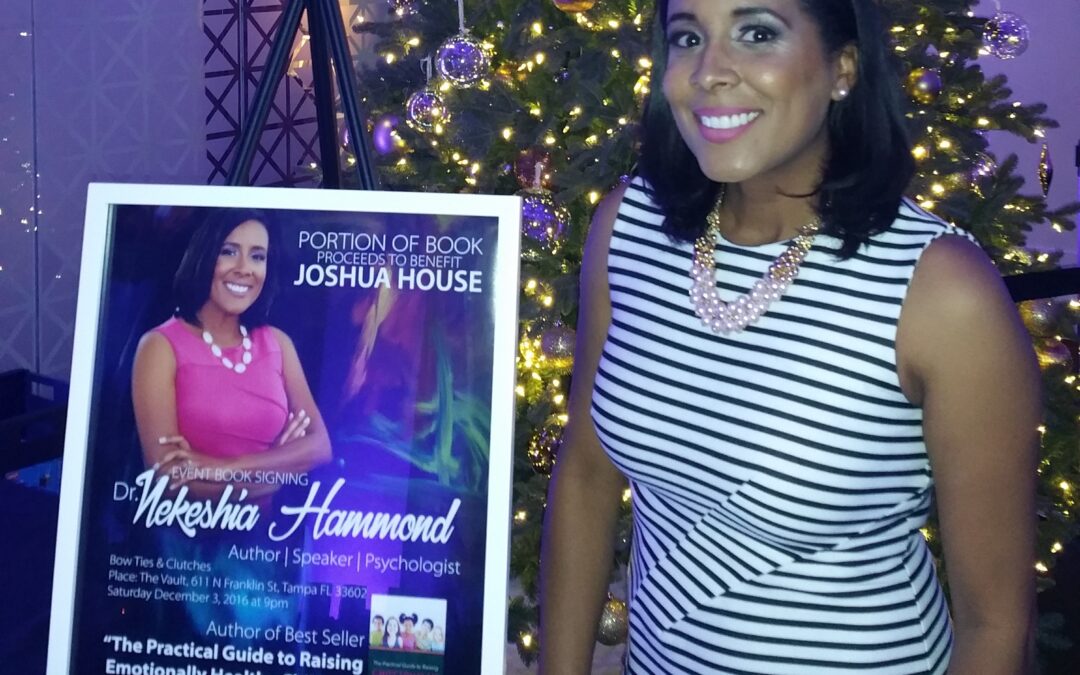 Dr. Hammond signs books at Bow Ties & Clutches event to benefit Joshua House