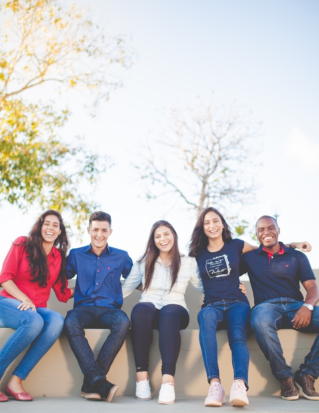 Teens sitting together in a relaxed setting