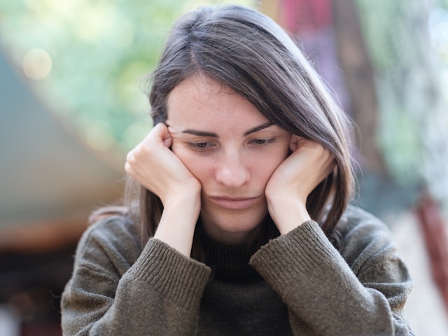 Adult woman considering whether ADHD testing may help identify attention and executive functioning challenges.
